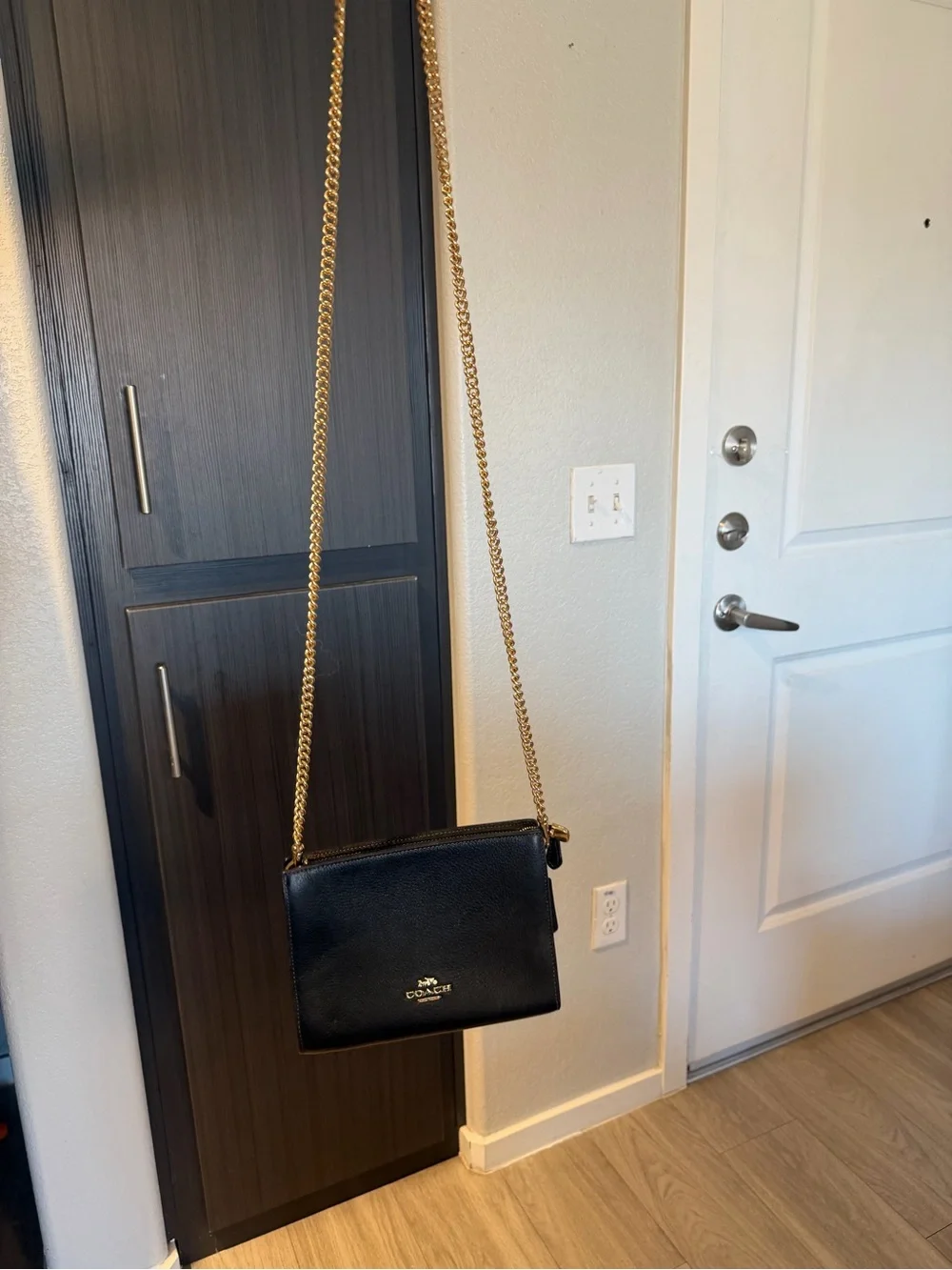 Coach Black Pebbled Leather Crossbody with Gold Chain Strap